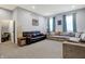 Spacious Gathering room with comfortable sectional sofa and large windows at 6427 Nicoson Way, Indianapolis, IN 46259