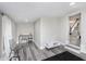 Bright, finished basement space features a workspace with a desk and chair at 1306 S Talbott St, Indianapolis, IN 46225