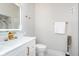 Modern bathroom with white vanity and gold fixtures at 1306 S Talbott St, Indianapolis, IN 46225