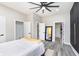 Spacious bedroom with a full-size bed and mirrored closet at 1306 S Talbott St, Indianapolis, IN 46225