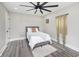 Charming bedroom with gray bed and green curtains at 1306 S Talbott St, Indianapolis, IN 46225