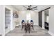 Cozy dining area with a four-person table and access to bathroom at 1306 S Talbott St, Indianapolis, IN 46225