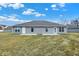 Gray siding house with a large backyard at 1432 Coen Ct, Columbus, IN 47201