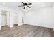 Bright bedroom featuring vinyl plank flooring and ample closet space at 1472 Coen Ct, Columbus, IN 47201
