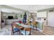 Open concept dining area with a view into the living room and kitchen at 1506 N Salem Ct, Greenfield, IN 46140