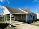Updated ranch home featuring a carport at 1714 S Goodlet Ave, Indianapolis, IN 46241