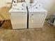 Basement laundry area with washer and dryer at 1714 S Goodlet Ave, Indianapolis, IN 46241