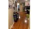 Hardwood floors in a hallway leading to living room at 4112 Eagle Cove E Dr, Indianapolis, IN 46254