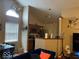 Open living room and kitchen area with vaulted ceilings at 4112 Eagle Cove E Dr, Indianapolis, IN 46254