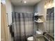 Updated bathroom with gray subway tile, shower, and modern vanity at 4204 W Palomino Ct, Muncie, IN 47304