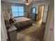 Spacious bedroom with large windows and en-suite bathroom access at 4204 W Palomino Ct, Muncie, IN 47304