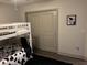 bedroom with bunk bed, closet, and cow print bedding at 4204 W Palomino Ct, Muncie, IN 47304
