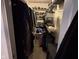 Walk-in closet with ample shelving and hanging space at 4204 W Palomino Ct, Muncie, IN 47304