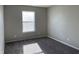 Well-lit bedroom with neutral walls and plush carpeting at 7530 Redcliff Rd, Indianapolis, IN 46256