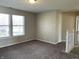 Bright bedroom with neutral walls and plush carpeting at 7530 Redcliff Rd, Indianapolis, IN 46256