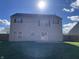 Two story house with backyard and wooden fence at 7530 Redcliff Rd, Indianapolis, IN 46256