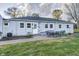 Rear view of the house with a patio and landscaping at 1311 N East St, Lebanon, IN 46052