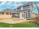 Large back patio with stamped concrete and access to the house at 1423 Hoyt Ave, Indianapolis, IN 46203