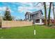 Large backyard with a wooden fence and grassy area at 1423 Hoyt Ave, Indianapolis, IN 46203
