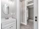 Simple bathroom with vanity and mirror at 1423 Hoyt Ave, Indianapolis, IN 46203