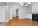 Open dining room with hardwood floors and view to living room at 1423 Hoyt Ave, Indianapolis, IN 46203