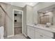Elegant bathroom featuring double sinks and a walk-in shower at 1829 Grand Vista Blvd, Greenwood, IN 46143
