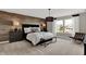 Bright bedroom with wood-like wall and comfortable sitting chair at 1829 Grand Vista Blvd, Greenwood, IN 46143