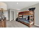 Bright bedroom featuring a bunk bed and ample closet space at 1829 Grand Vista Blvd, Greenwood, IN 46143
