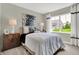 Cozy bedroom with a window and contemporary decor at 1829 Grand Vista Blvd, Greenwood, IN 46143