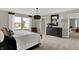 Main bedroom with large windows, dresser, and access to sitting area at 1829 Grand Vista Blvd, Greenwood, IN 46143