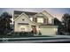 Two-story house with neutral siding, brick accents, and a two-car garage at 1829 Grand Vista Blvd, Greenwood, IN 46143