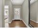 Bright foyer with wood-look floors and access to a bedroom at 1829 Grand Vista Blvd, Greenwood, IN 46143