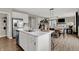 Open concept kitchen with island, stainless steel appliances, and pantry at 1829 Grand Vista Blvd, Greenwood, IN 46143