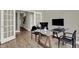Spacious office with a glass desk, two chairs and view into hallway at 1829 Grand Vista Blvd, Greenwood, IN 46143