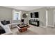 Upstairs sitting area with L-shaped sofa and wood coffee table at 1829 Grand Vista Blvd, Greenwood, IN 46143