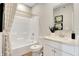Bathroom boasts a shower/tub combo, white vanity, and tasteful decor at 1841 Grand Vista Blvd, Greenwood, IN 46143