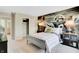 Bedroom with a full bed, closet, and football mural at 1841 Grand Vista Blvd, Greenwood, IN 46143