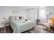 Cozy bedroom with a queen-size bed and calming decor at 5114 Hillside Ave, Indianapolis, IN 46205
