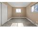 Well-lit bedroom featuring wood-look flooring and neutral walls at 5902 E 16Th St, Indianapolis, IN 46218