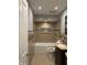 Bathroom featuring tile shower, tub, vanity, and modern fixtures at 636 Creston Point Cir, Indianapolis, IN 46239