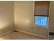 Empty bedroom with carpet and window view, awaiting your personal touch at 636 Creston Point Cir, Indianapolis, IN 46239