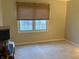 Empty bedroom with carpet flooring and window blinds, ready for personalization at 636 Creston Point Cir, Indianapolis, IN 46239