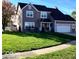 Two-story house with a spacious lawn and attached two-car garage at 636 Creston Point Cir, Indianapolis, IN 46239