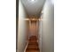 Hallway with hardwood floors and several doors leading to other rooms at 636 Creston Point Cir, Indianapolis, IN 46239