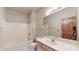 Clean bathroom with a tub and shower combo at 9699 Prairiewood Way, Carmel, IN 46032