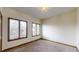 Bright bedroom with two windows and neutral walls at 9699 Prairiewood Way, Carmel, IN 46032