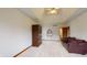 Spacious bedroom with a ceiling fan and built-in cabinet at 9699 Prairiewood Way, Carmel, IN 46032