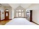 Spacious dining room with hardwood floors and large windows at 9699 Prairiewood Way, Carmel, IN 46032