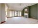 Living room with fireplace and access to backyard at 9699 Prairiewood Way, Carmel, IN 46032