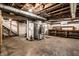 Unfinished basement with utilities and workshop area at 1708 S Randolph St, Indianapolis, IN 46203